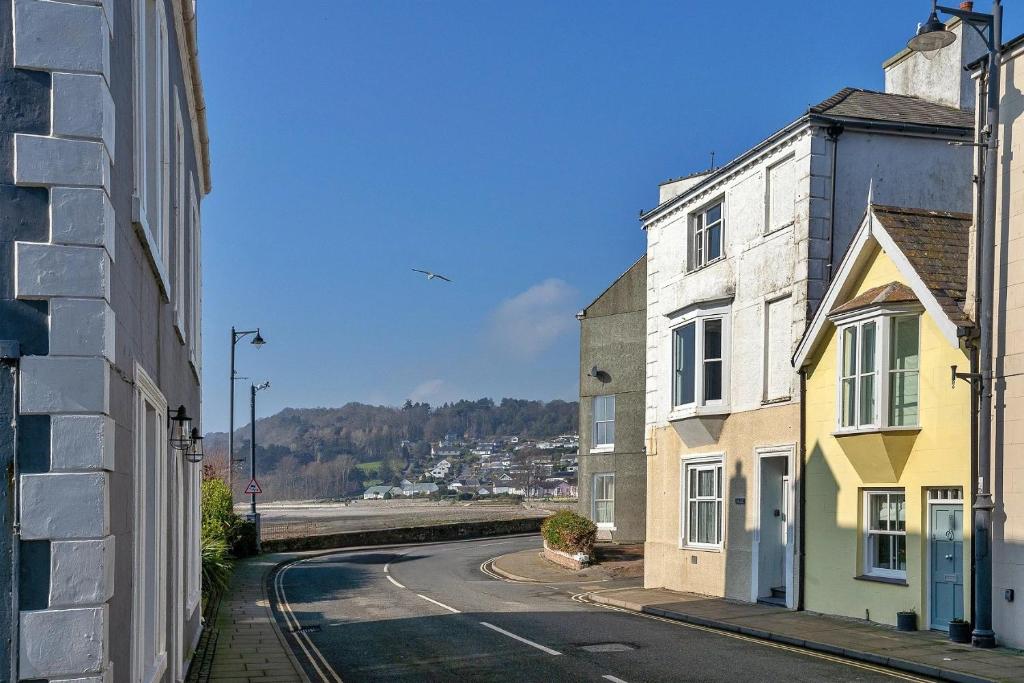 an empty street in a town with buildings at Finest Retreats - No 62 at Gadlys House in Beaumaris