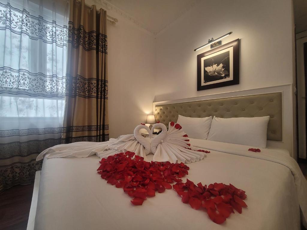 Postel nebo postele na pokoji v ubytování Luxor Boutique Hotel
