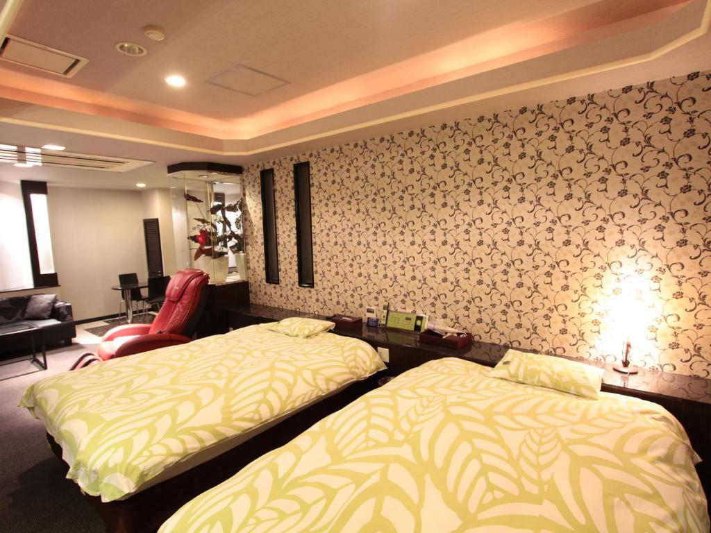 Voodi või voodid majutusasutuse G HOTEL 一宮 -Hotel & Resorts- toas