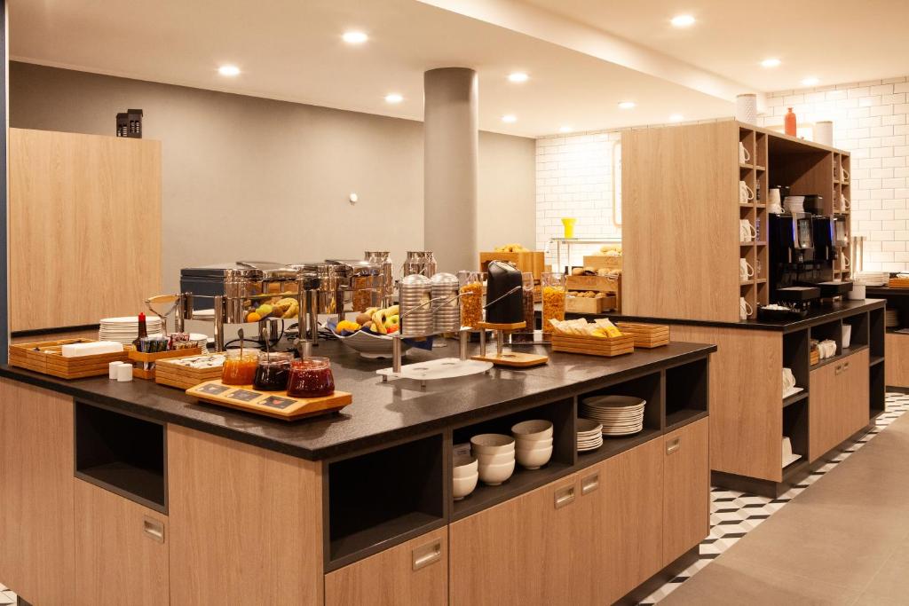Kuchyň nebo kuchyňský kout v ubytování Holiday Inn Express Neunkirchen by IHG