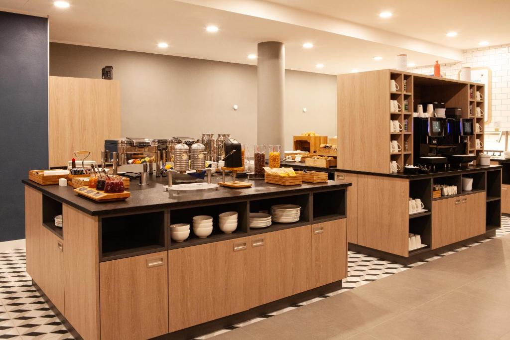 Kuchyň nebo kuchyňský kout v ubytování Holiday Inn Express Neunkirchen by IHG