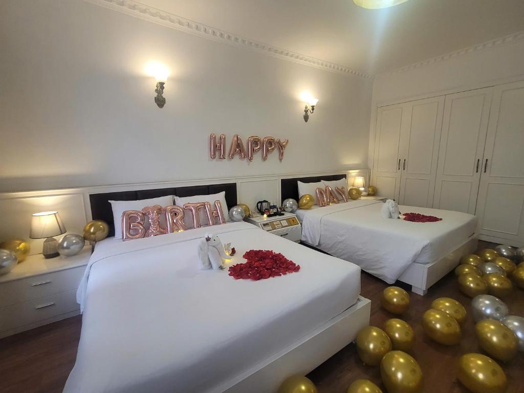 Postel nebo postele na pokoji v ubytování Luxor Boutique Hotel