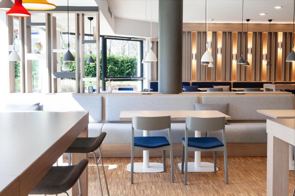 Posezení v ubytování Holiday Inn Express Neunkirchen by IHG