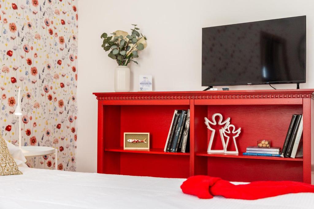 TV a/nebo společenská místnost v ubytování B&B Calamoresca