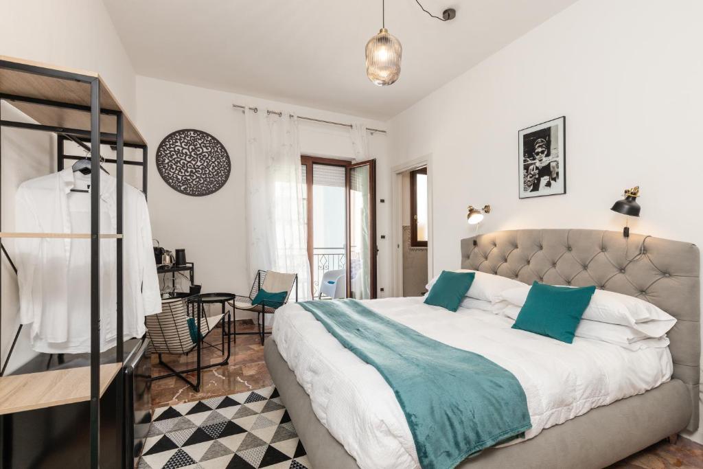 Postel nebo postele na pokoji v ubytování B&B Calamoresca