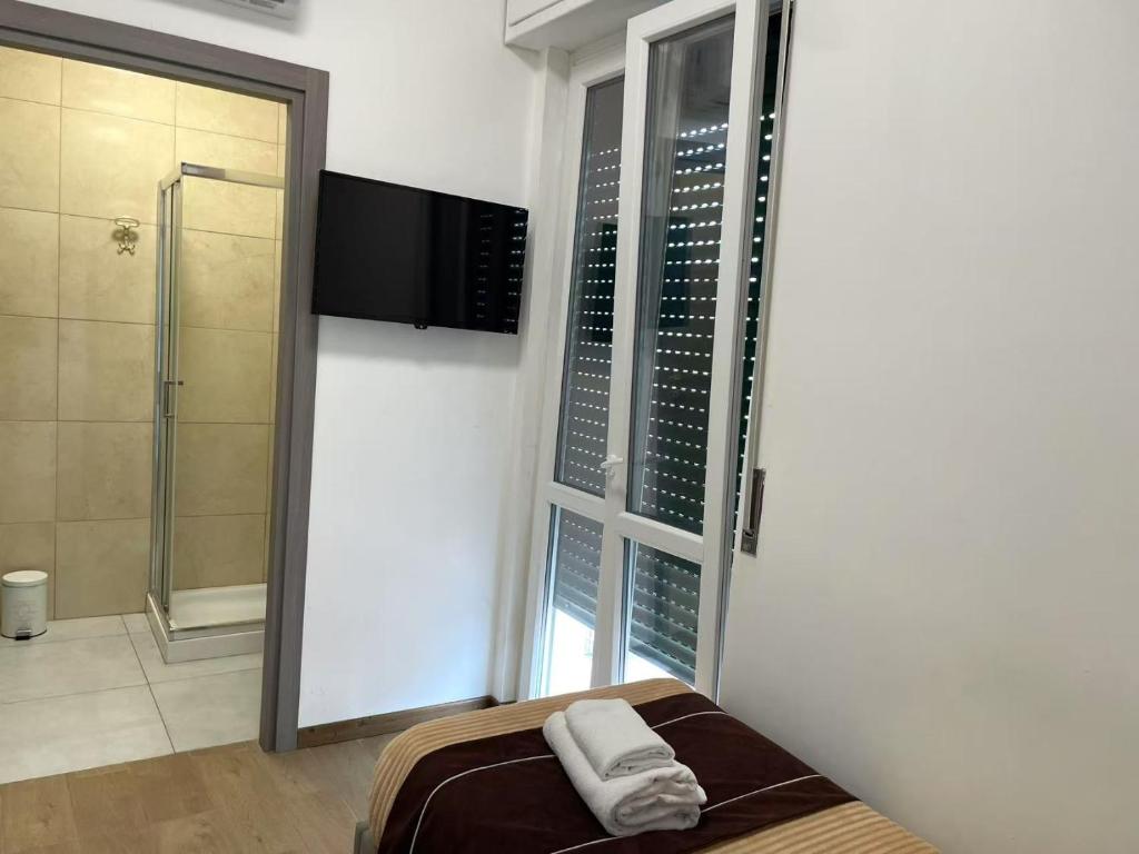 Koupelna v ubytování FIERA ROOMS