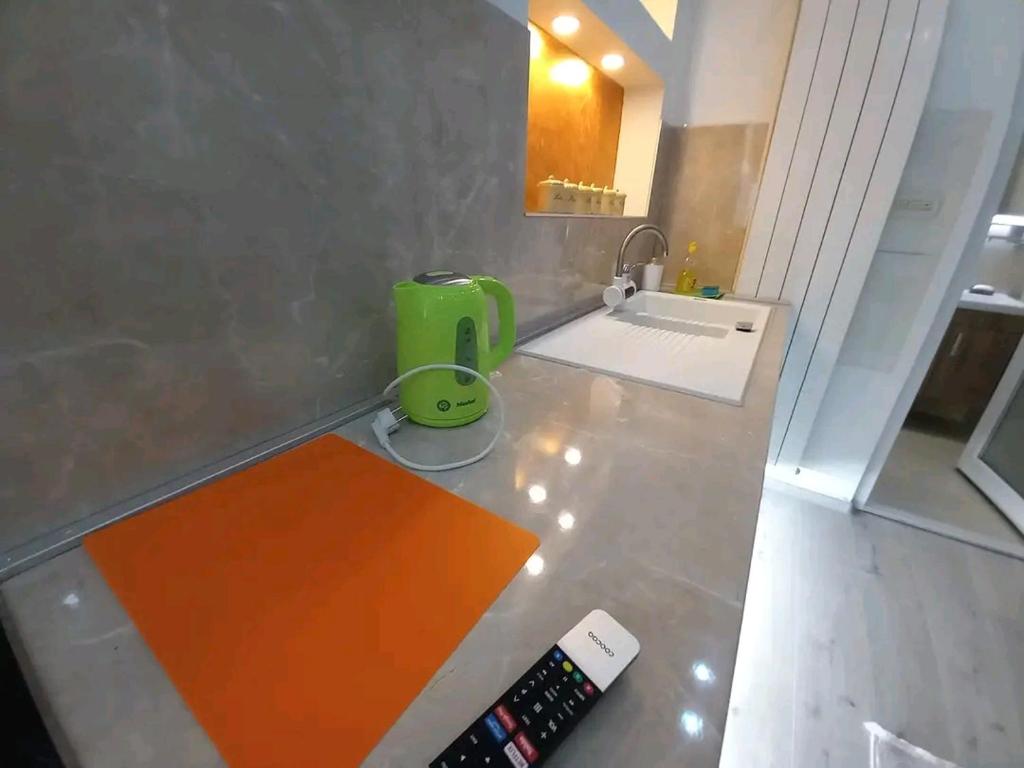 a kitchen with a counter top with a sink at Sarajevo apartman Ilidza Springs parking free in Sarajevo