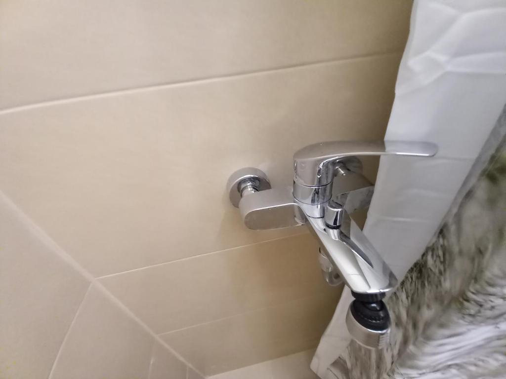 a bathroomaucet in the corner of a bathroom at Sarajevo apartman Ilidza Springs parking free in Sarajevo