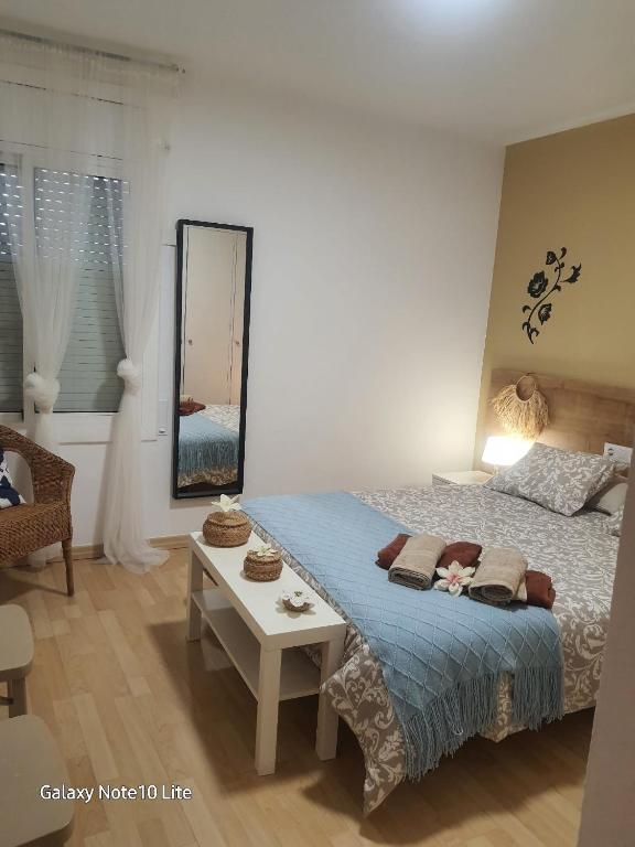 Posteľ alebo postele v izbe v ubytovaní Precioso apartamento a menos de 100m de la playa