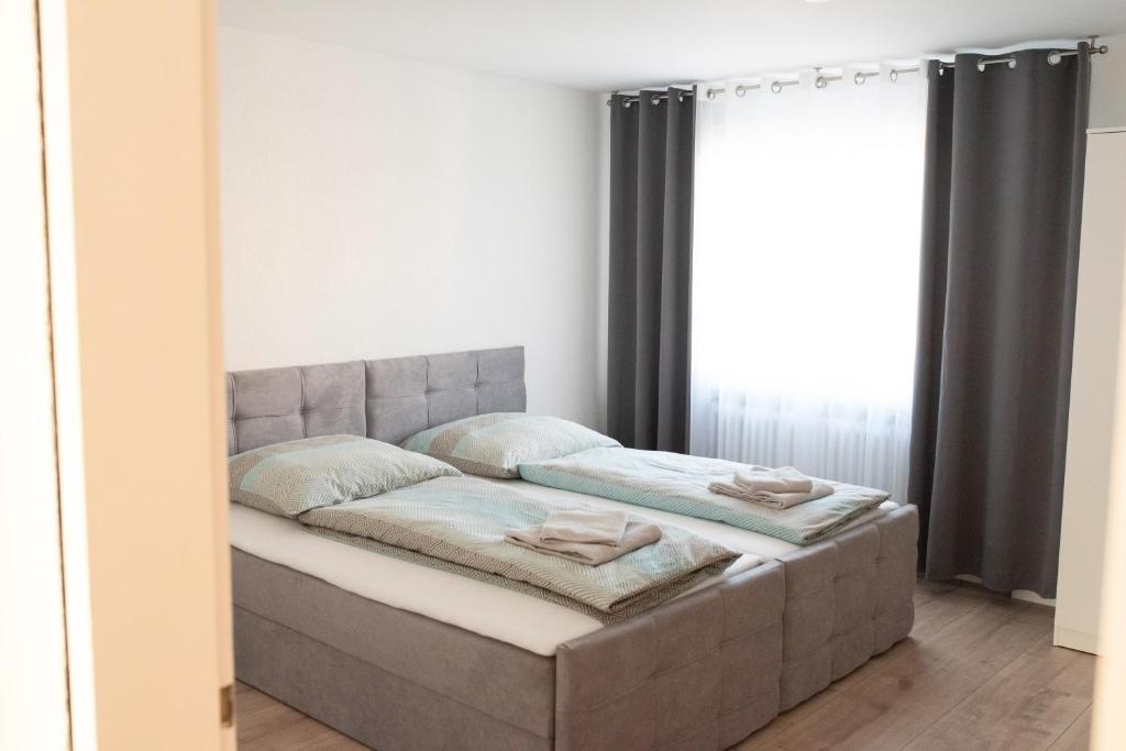 Postel nebo postele na pokoji v ubytování Ferienzimmer Albbruck