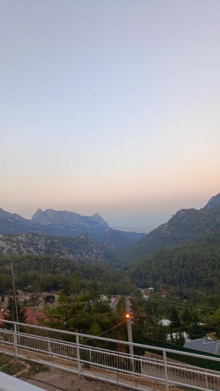 a view of a valley with mountains in the distance at Likya Vadi Evleri Nature and tranquility in Antalya