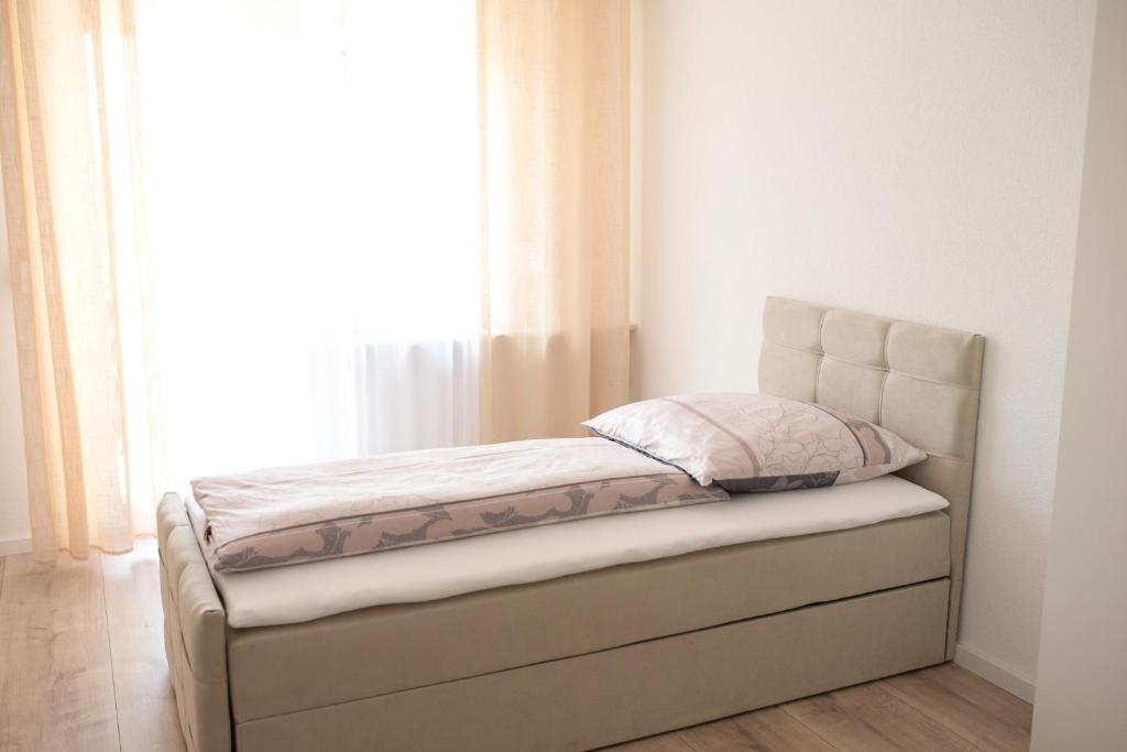 Postel nebo postele na pokoji v ubytování Ferienzimmer Albbruck
