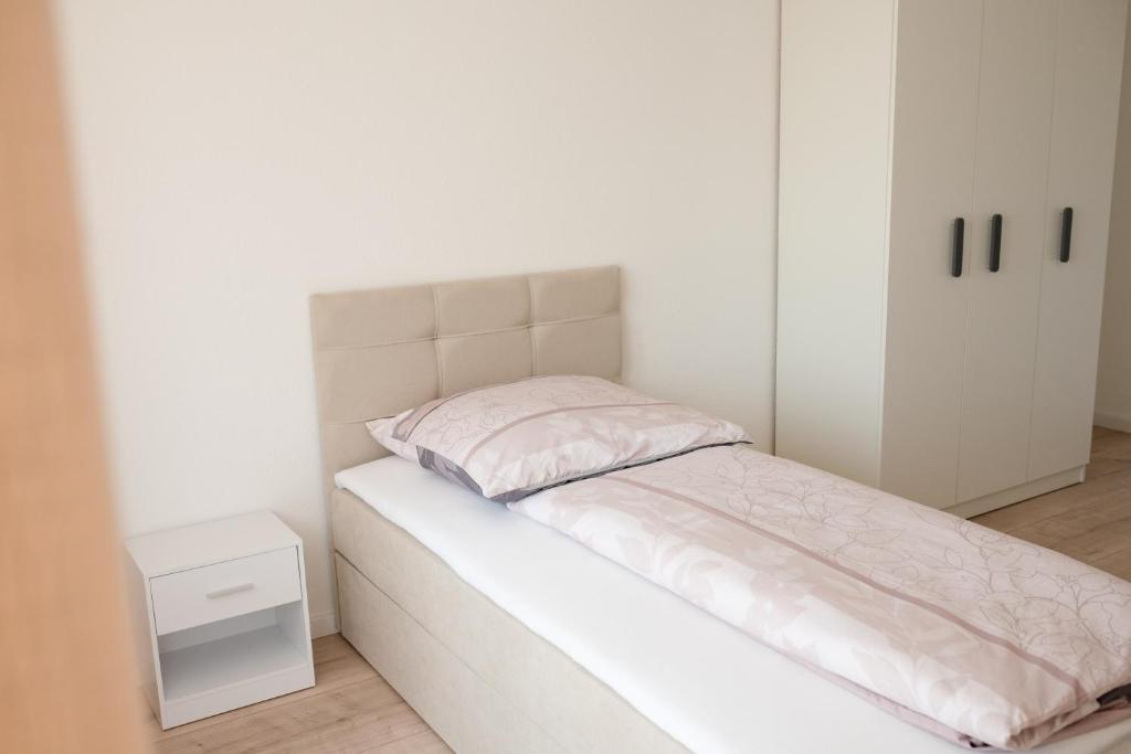 Postel nebo postele na pokoji v ubytování Ferienzimmer Albbruck