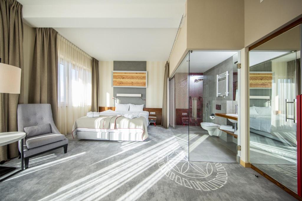 Posteľ alebo postele v izbe v ubytovaní Hotel Kopieniec Fizjo- Med & SPA