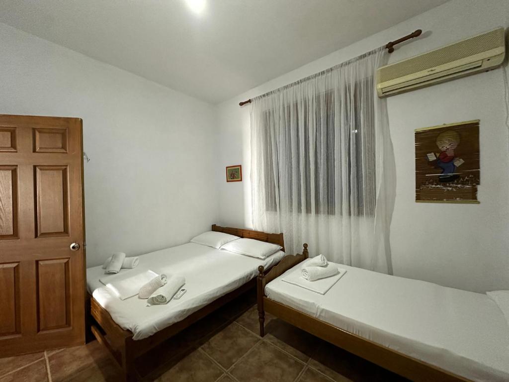 Postel nebo postele na pokoji v ubytování Vila Sosana