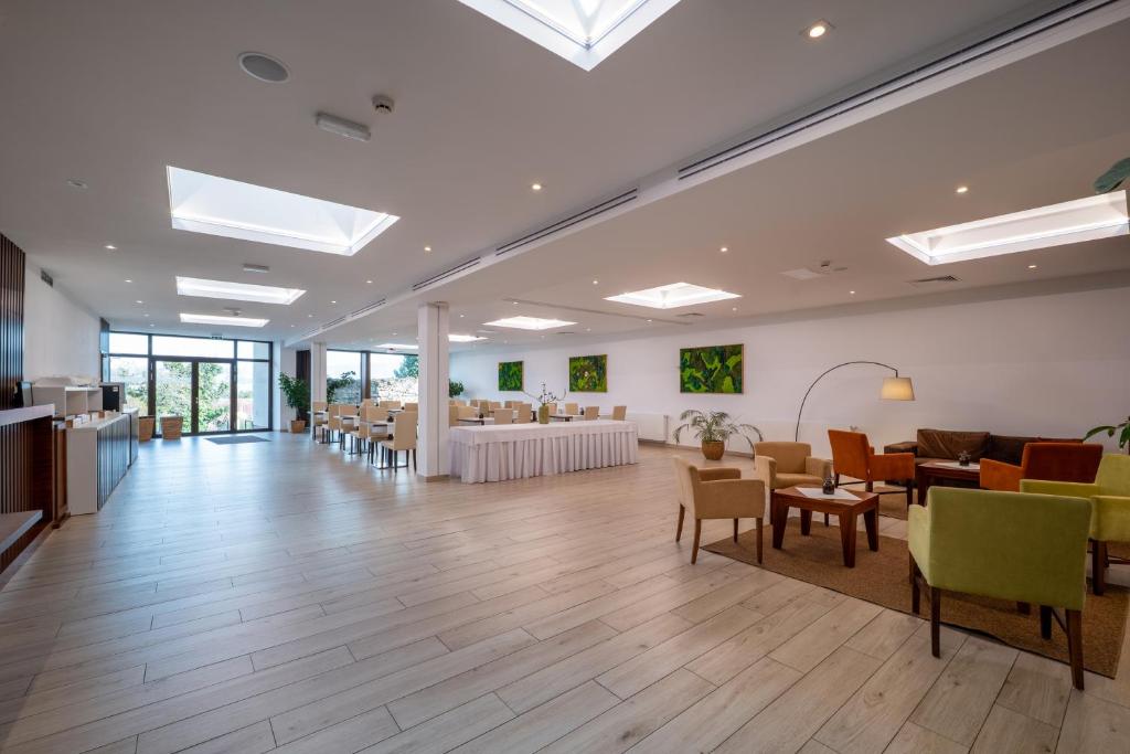 Posezení v ubytování Hotel BELASSI