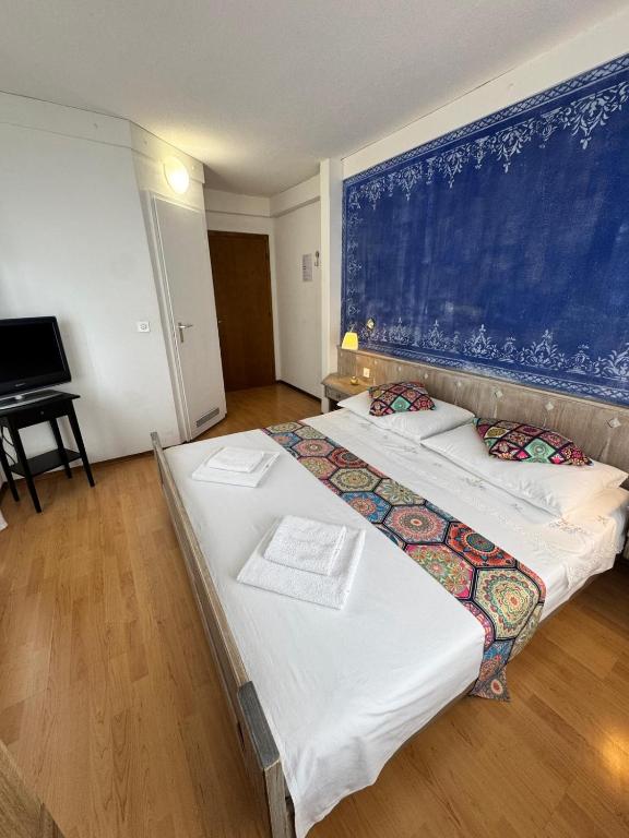 Postel nebo postele na pokoji v ubytování Hotel Post Cunter Biancardi