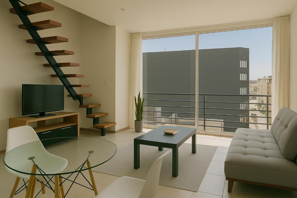TV a/nebo společenská místnost v ubytování Matrisa Santa Teresa Apartments