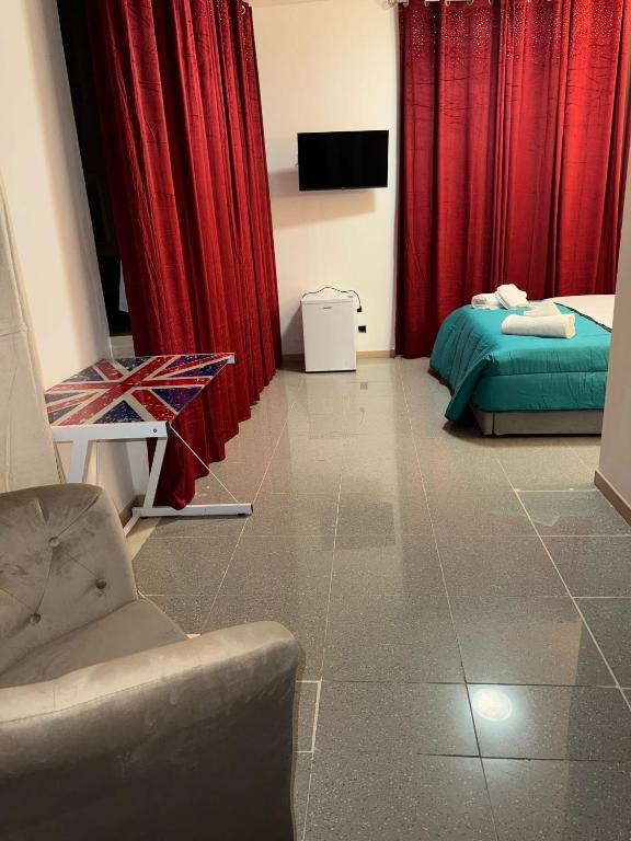 TV a/nebo společenská místnost v ubytování TMS Venice Rooms