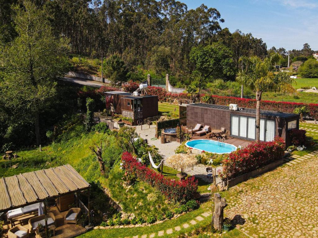 an aerial view of a house with a swimming pool at Bruval Eco Retreat in Sandim