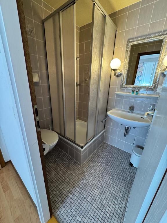 Koupelna v ubytování Hotel Post Cunter Biancardi