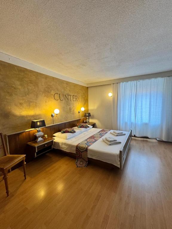 Postel nebo postele na pokoji v ubytování Hotel Post Cunter Biancardi
