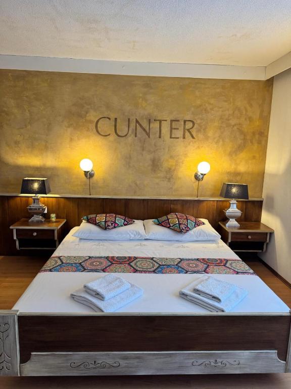 Postel nebo postele na pokoji v ubytování Hotel Post Cunter Biancardi