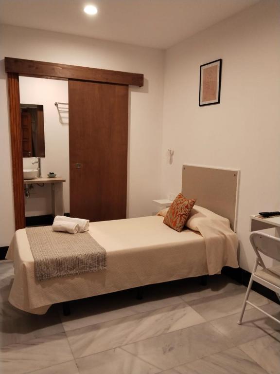 Postel nebo postele na pokoji v ubytování Hotel Océano Centro