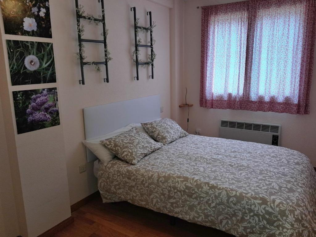 Postel nebo postele na pokoji v ubytování Apartamento Canfranc