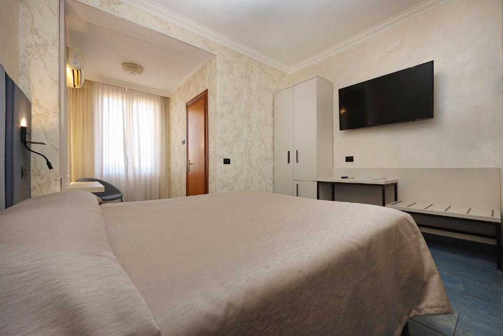 TV a/nebo společenská místnost v ubytování Hotel Rimini