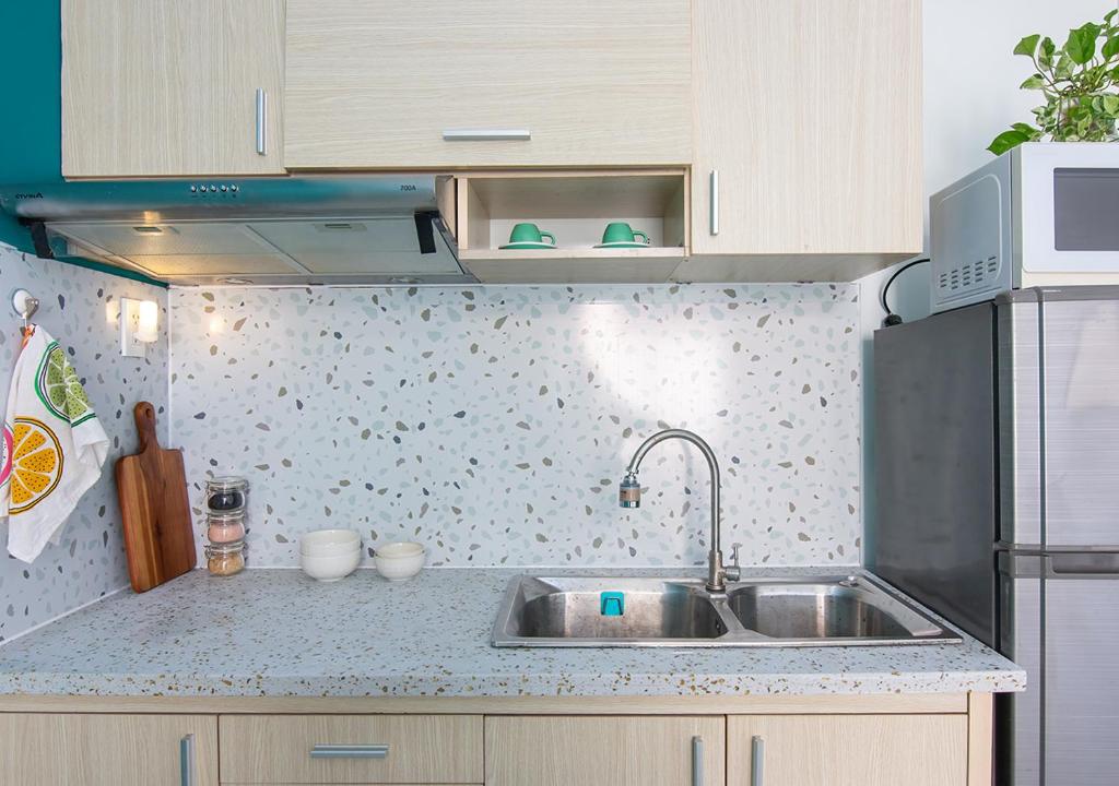 Kuchyň nebo kuchyňský kout v ubytování Lumina Home