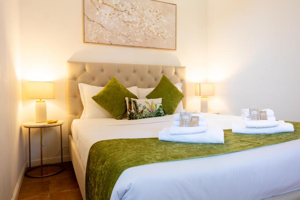 Giường trong phòng chung tại MB SUITES Margutta