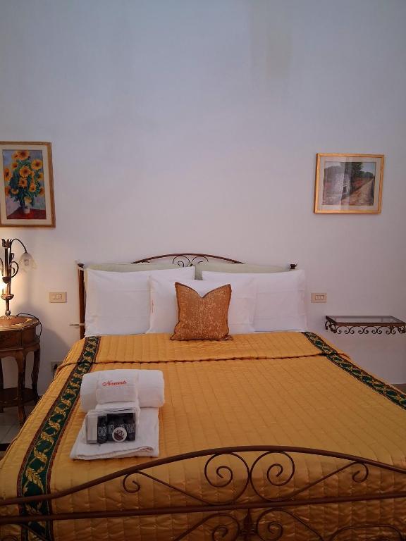 Postel nebo postele na pokoji v ubytování BnB '900 Lecce centro