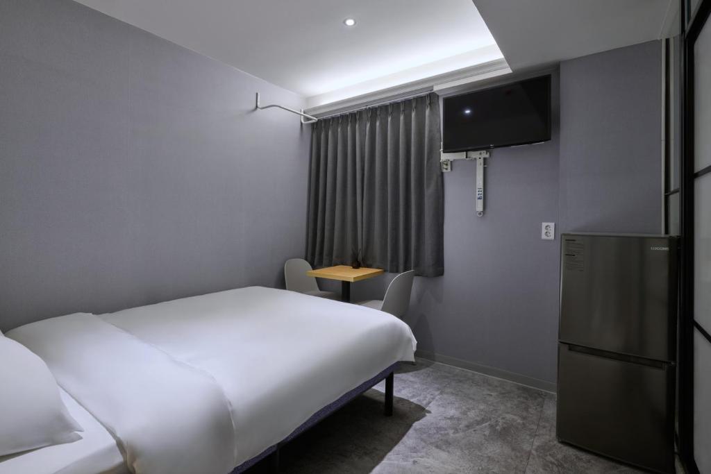 Postel nebo postele na pokoji v ubytování D Stay Hostel Dongdaemun