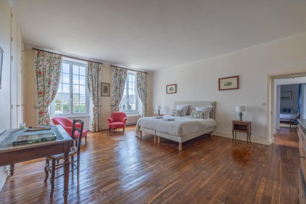 Ένα ή περισσότερα κρεβάτια σε δωμάτιο στο Le Cottage de Marguerite