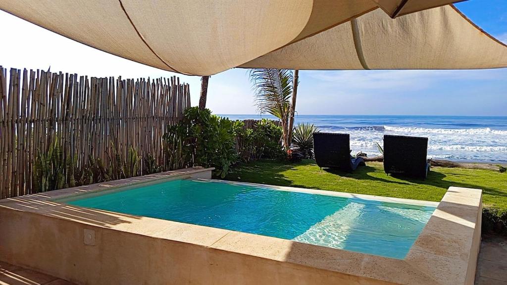 Bazén v ubytování Casa Fly Paredón nebo v jeho okolí