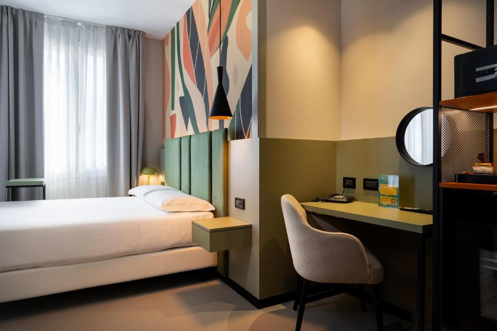 Postel nebo postele na pokoji v ubytování Elite Hotel & Spa