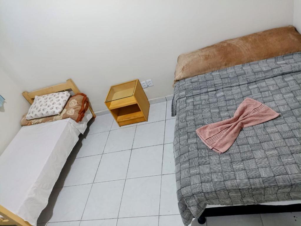 Postel nebo postele na pokoji v ubytování Mega Hotel