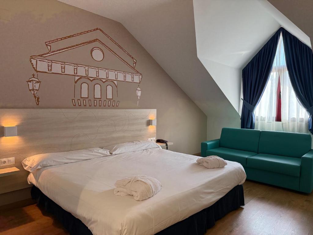 Postel nebo postele na pokoji v ubytování Hotel Balneario de Graena