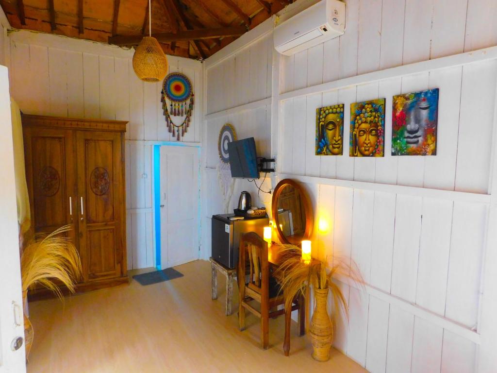 Posezení v ubytování Lotus & Teak Villas