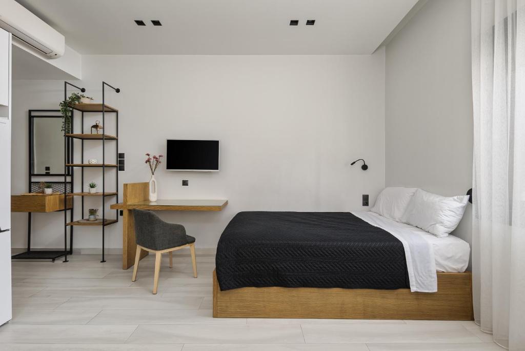Posteľ alebo postele v izbe v ubytovaní MELIGEO Suites Center of IOANNINA