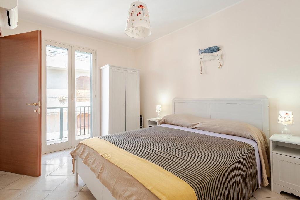 En eller flere senge i et værelse på Il Ficodindia Guest House WI-Fi a due passi dal centro