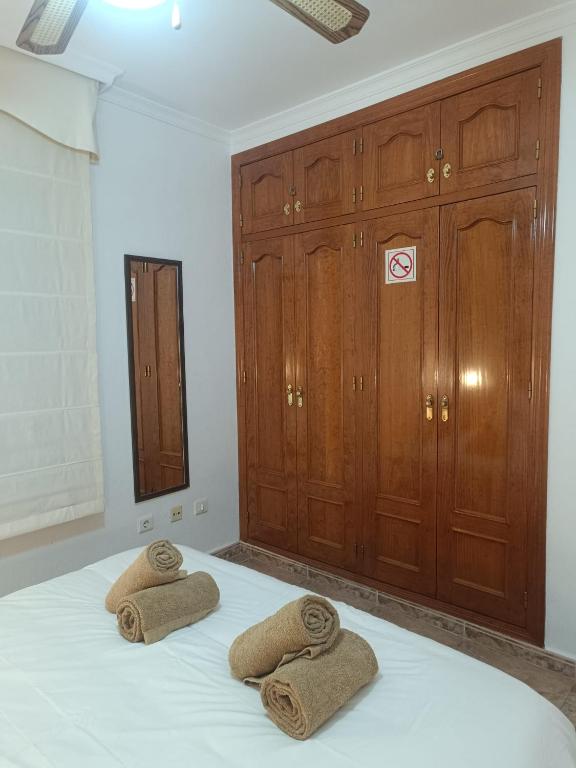 Postel nebo postele na pokoji v ubytování Bahía de Vera Apartamento Mamen