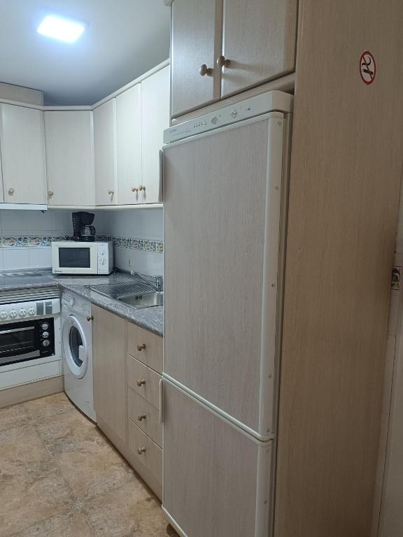 Kuchyň nebo kuchyňský kout v ubytování Bahía de Vera Apartamento Mamen