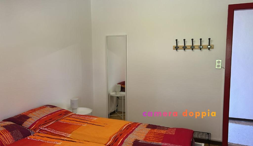 Postel nebo postele na pokoji v ubytování Casa Sant'Angelo