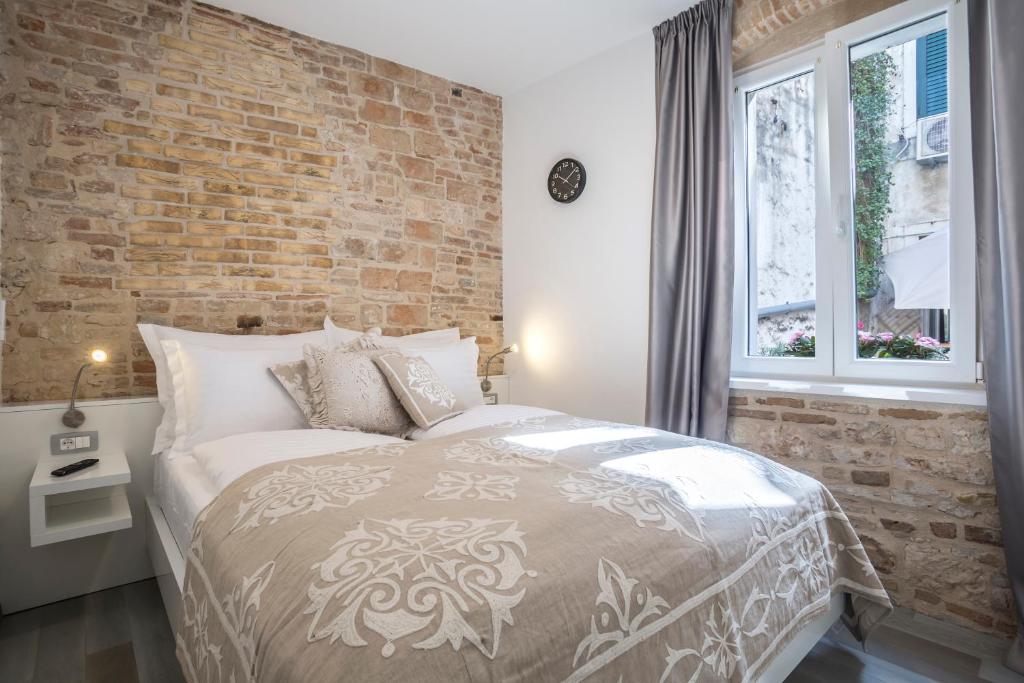 Postel nebo postele na pokoji v ubytování Centro di Centri Rooms