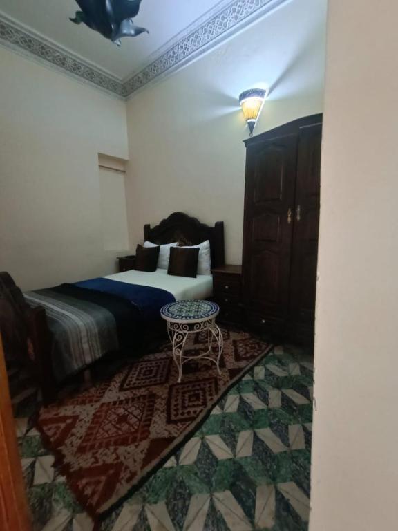 Postel nebo postele na pokoji v ubytování Riad lala Drissia