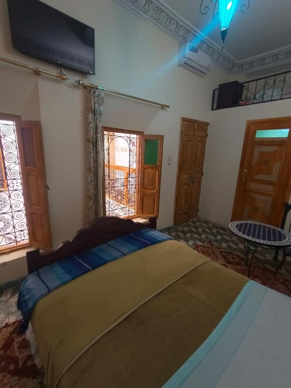 Postel nebo postele na pokoji v ubytování Riad lala Drissia