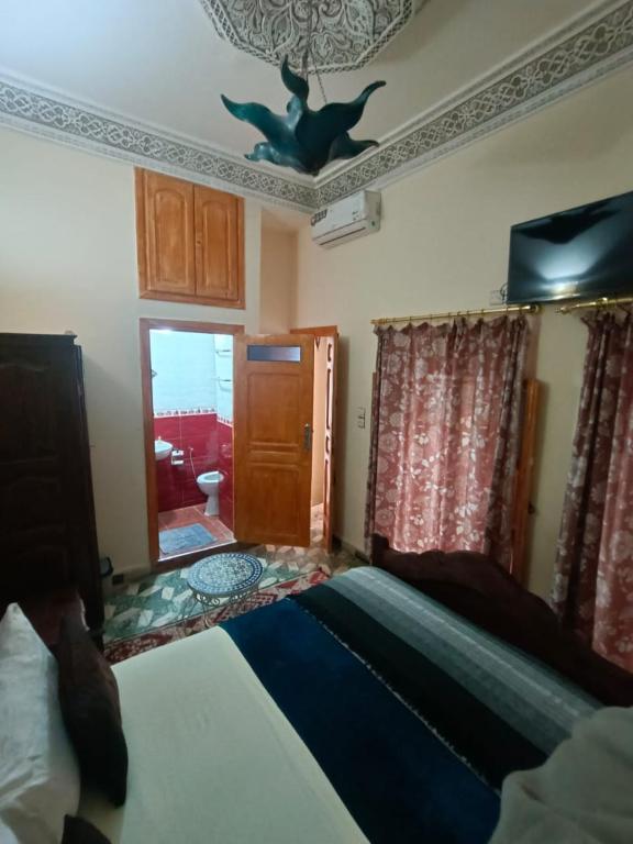 Postel nebo postele na pokoji v ubytování Riad lala Drissia