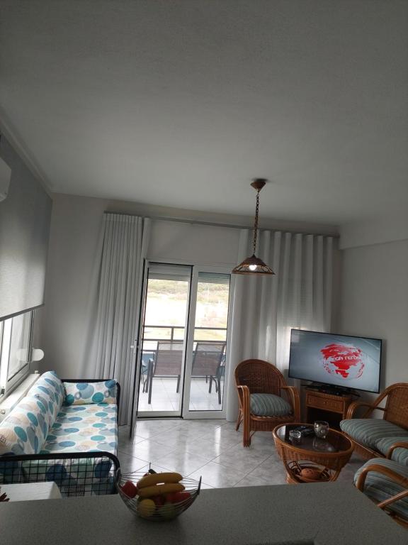 A television and/or entertainment centre at Maries Seaside Home